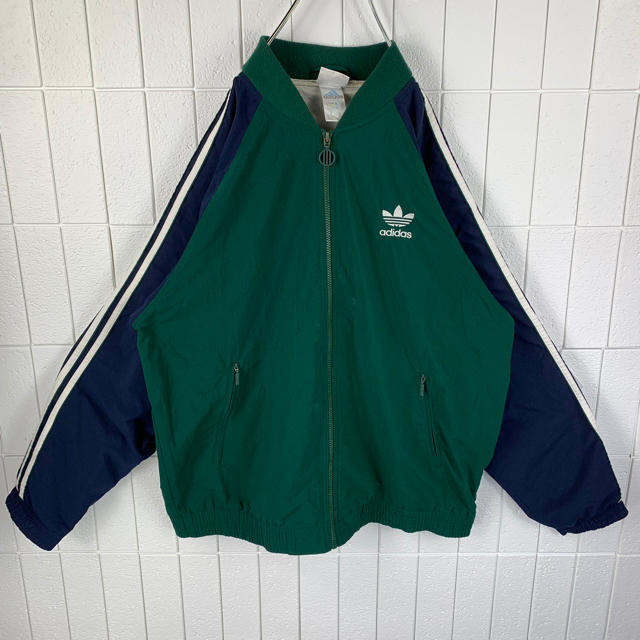 adidas(アディダス)のYUYUさん 専用 アディダス バックロゴ ゆるだぼ 90s ナイロン ジャージ メンズのジャケット/アウター(ナイロンジャケット)の商品写真