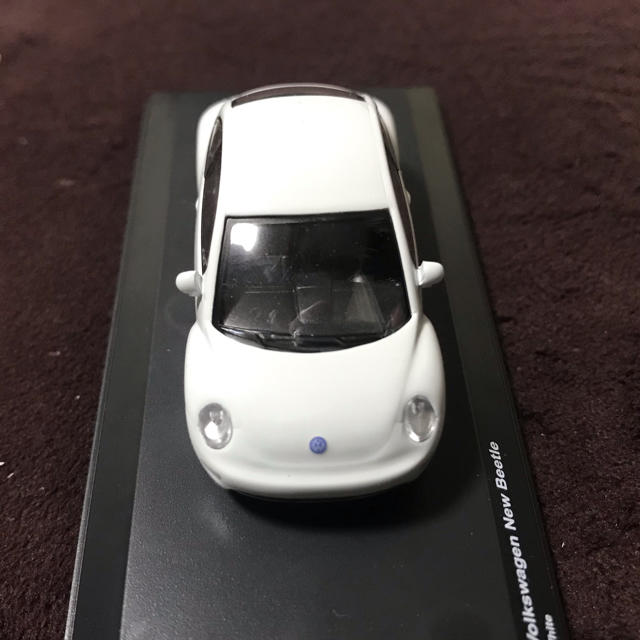 Volkswagen(フォルクスワーゲン)のneko様専用  京商 1/64 フォルクスワーゲン  ニュービートル 白 エンタメ/ホビーのおもちゃ/ぬいぐるみ(ミニカー)の商品写真