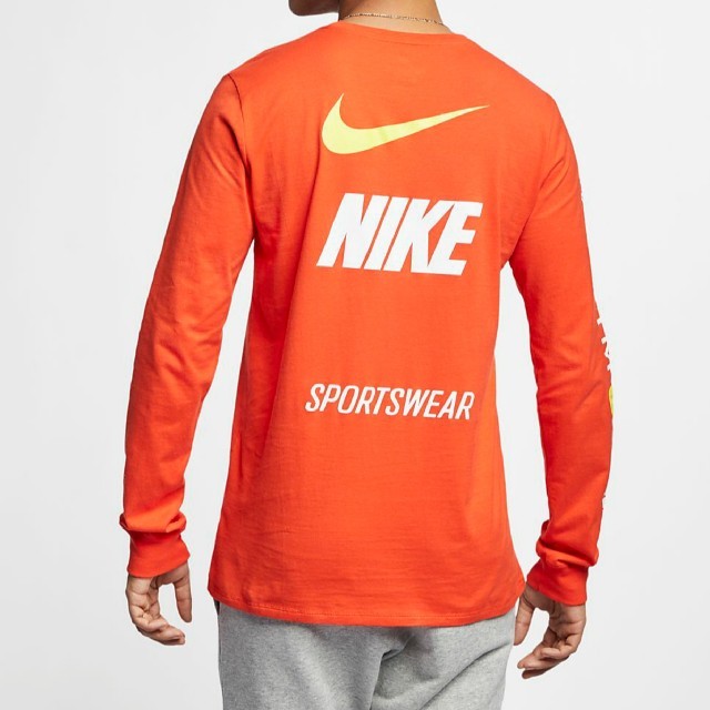 NIKE(ナイキ)のNIKE ナイキ NSW Tシャツ ロンT オレンジ US Sサイズ メンズのトップス(Tシャツ/カットソー(七分/長袖))の商品写真