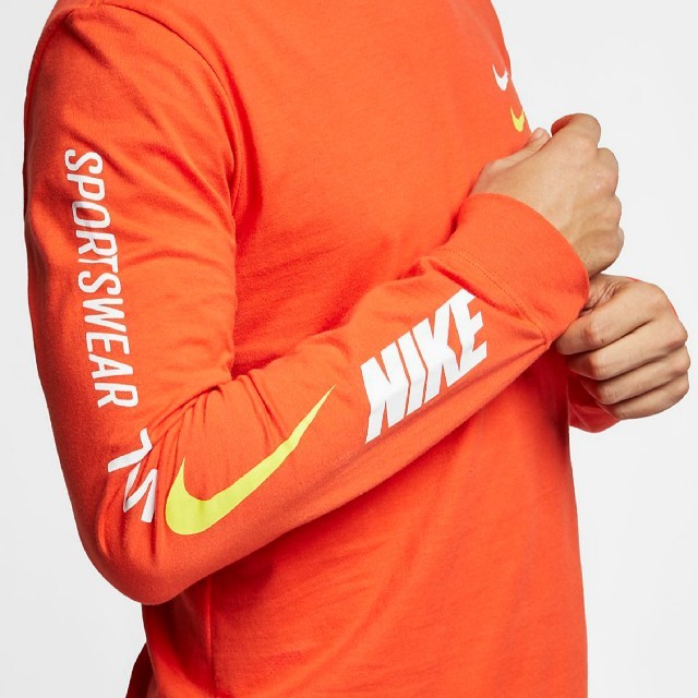 NIKE(ナイキ)のNIKE ナイキ NSW Tシャツ ロンT オレンジ US Sサイズ メンズのトップス(Tシャツ/カットソー(七分/長袖))の商品写真