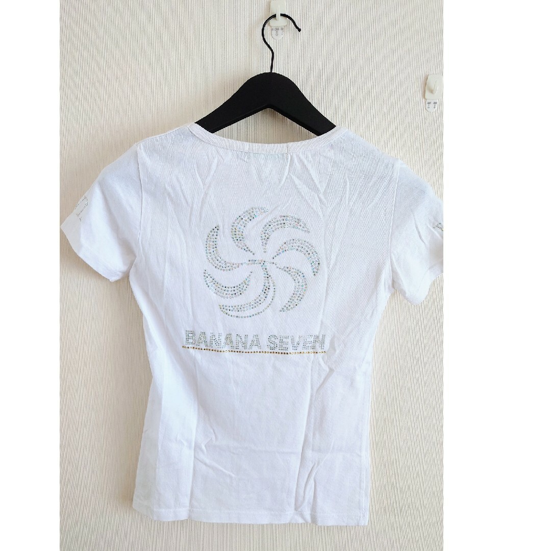 877*7(BANANA SEVEN)(バナナセブン)のBANANA SEVEN 白Tシャツ ストーン付き レディースのトップス(Tシャツ(半袖/袖なし))の商品写真
