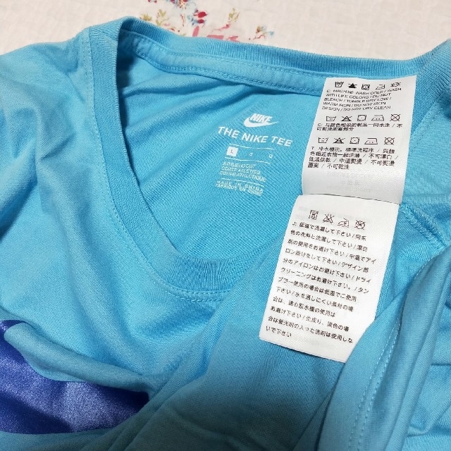 NIKE(ナイキ)のNIKE☆レディースTシャツ　L レディースのトップス(Tシャツ(半袖/袖なし))の商品写真
