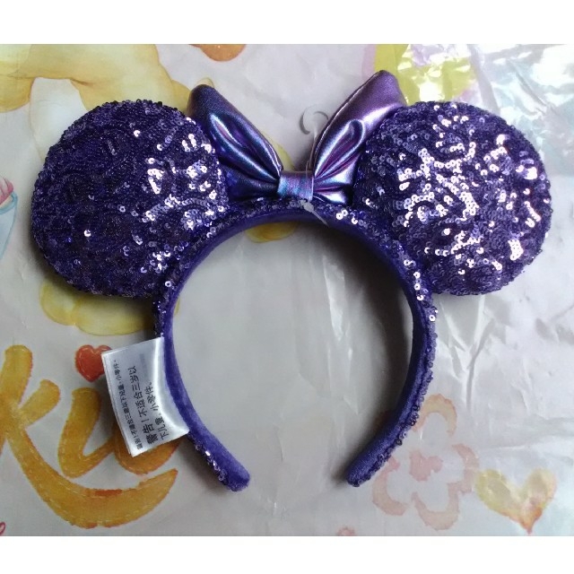Disney(ディズニー)の値下げ中！香港ディズニー限定　パープルカチューシャ　スパンコール　ミニーマウス レディースのヘアアクセサリー(カチューシャ)の商品写真