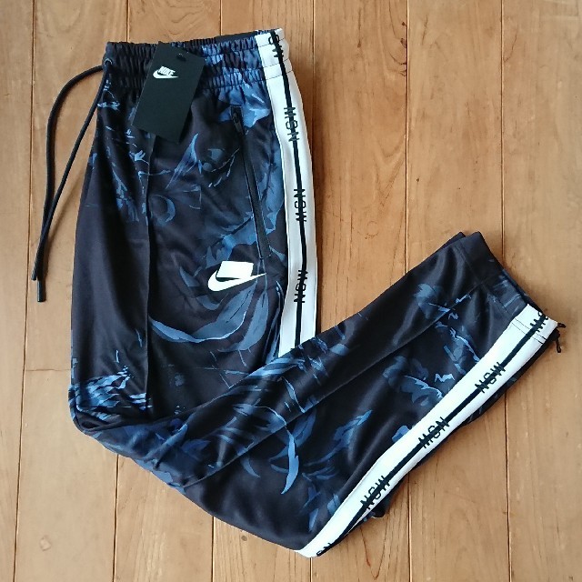NIKE - 【早い者勝ち】 NIKE NSW フローラル トラックパンツ ブルーの NIKE - 【早い者勝ち】 NIKE NSW フローラル トラックパンツ ブルーの