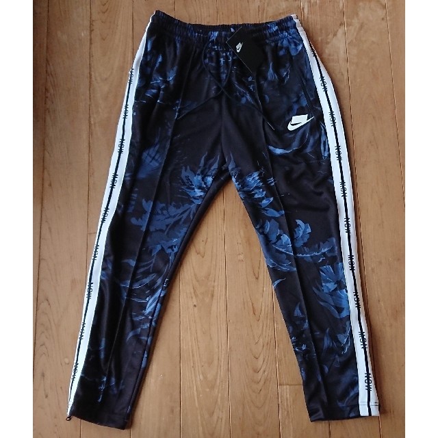 NIKE - 【早い者勝ち】 NIKE NSW フローラル トラックパンツ ブルーの NIKE - 【早い者勝ち】 NIKE NSW フローラル トラックパンツ ブルーの