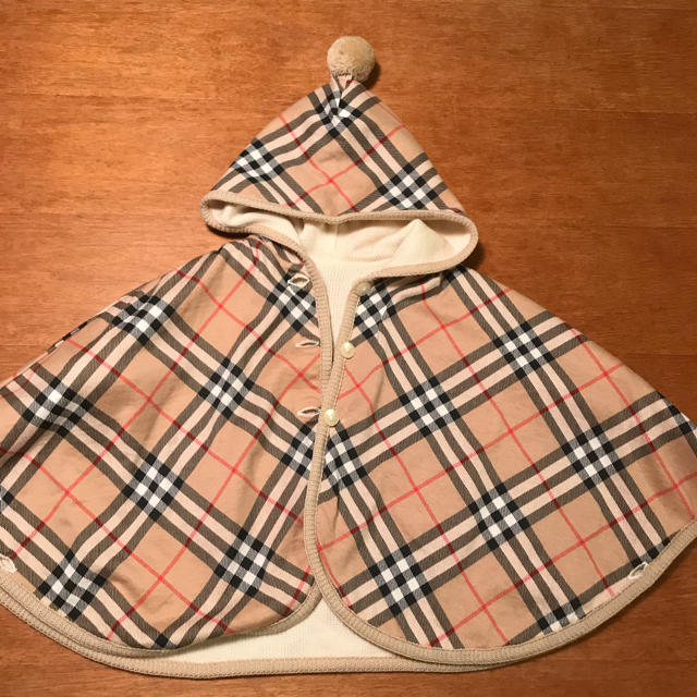 BURBERRY(バーバリー)の【美品】バーバリーポンチョ ケープ キッズ/ベビー/マタニティのベビー服(~85cm)(カーディガン/ボレロ)の商品写真