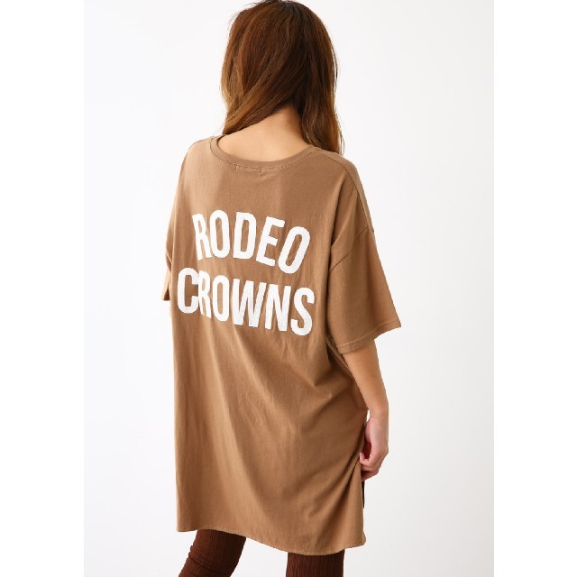 RODEO CROWNS WIDE BOWL(ロデオクラウンズワイドボウル)のブラウン 星条旗BIGポケットチュニック  安全、安心の値札タグつき正規品です。 レディースのトップス(Tシャツ(半袖/袖なし))の商品写真