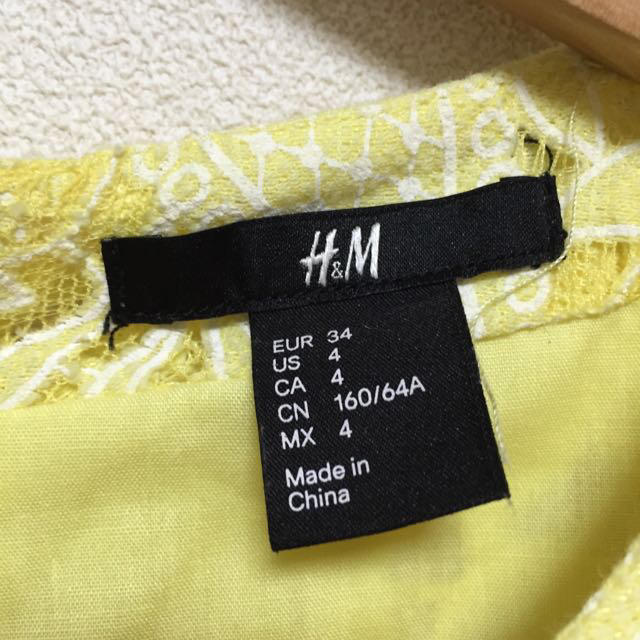 H&M(エイチアンドエム)のH&M#イエローレースOP レディースのワンピース(ミニワンピース)の商品写真