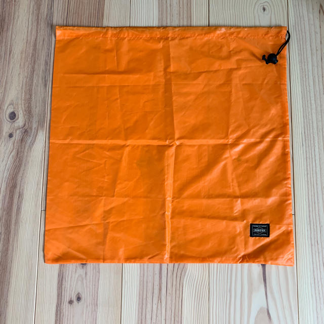 PORTER(ポーター)の新品未使用 ポーター 巾着 保存袋 オレンジ  メンズのバッグ(その他)の商品写真