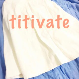 ティティベイト(titivate)のデニムスカート 白(ひざ丈スカート)