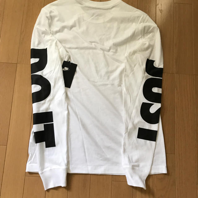 NIKE(ナイキ)のナイキJust Do It  ロングスリーブシャツ  Mサイズ　ホワイト メンズのトップス(Tシャツ/カットソー(七分/長袖))の商品写真