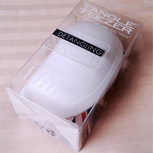 ★送料込み★タングルティーザー tangleteezer キャンディホワイト コスメ/美容のヘアケア/スタイリング(ヘアケア)の商品写真