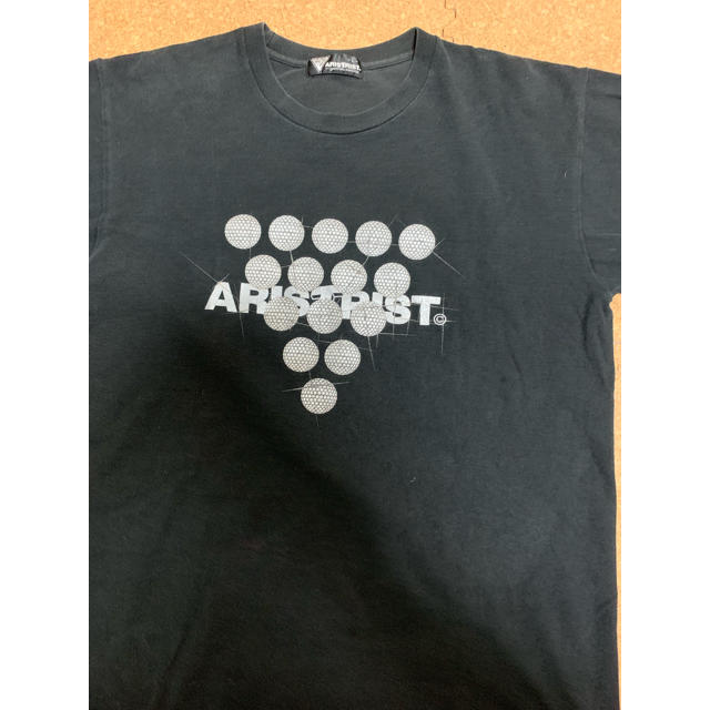 ARISTRIST(アリストトリスト)の激レアLサイズ！ARISTRIST×新日本プロレスリングTシャツ黒 メンズのトップス(Tシャツ/カットソー(半袖/袖なし))の商品写真