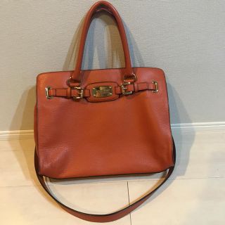 マイケルコース(Michael Kors)のオレンジのバッグ(トートバッグ)