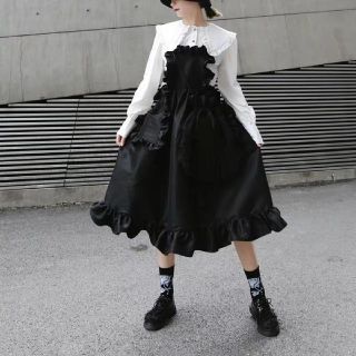 コムデギャルソン(COMME des GARCONS)のFRILLED APRON JUMPER SKIRT.(ひざ丈ワンピース)