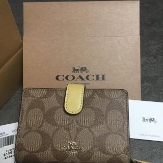 コーチ(COACH)の新品 COACH コーチ 折り財布 イエロー 週末お値下げ中(折り財布)