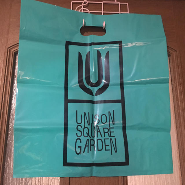 UNISON SQUARE GARDEN(ユニゾンスクエアガーデン)のUNISON SQUARE GARDEN ライブTシャツ 袋付き レディースのトップス(Tシャツ(半袖/袖なし))の商品写真