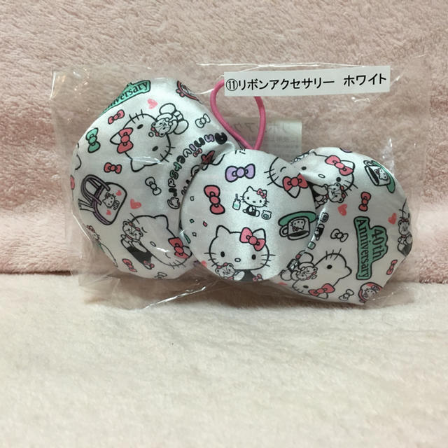 ハローキティ(ハローキティ)の【新品・未使用】ハローキティ❤︎リボンアクセサリー❤︎ホワイト❤︎ レディースのヘアアクセサリー(ヘアゴム/シュシュ)の商品写真