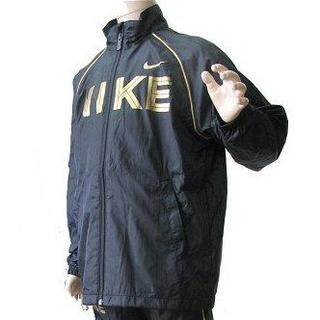 ナイキ(NIKE)の新品◆140cm NIKE 黒×ゴールドロゴウインドブレーカー(ジャケット/上着)