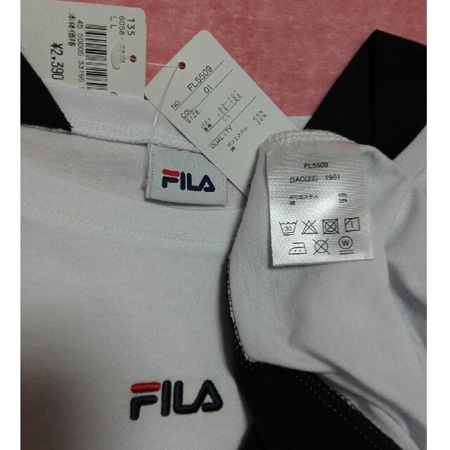 FILA(フィラ)の白地に黒線FILA チュニック レディースのトップス(Tシャツ(半袖/袖なし))の商品写真