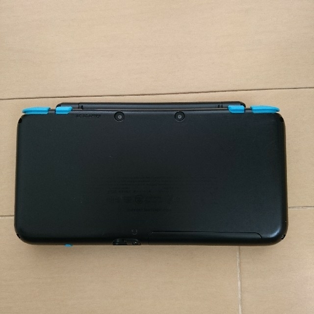 ニンテンドー2DS(ニンテンドー2DS)のNewニンテンドー2DS LL　ブラック×ターコイズ エンタメ/ホビーのゲームソフト/ゲーム機本体(携帯用ゲーム機本体)の商品写真