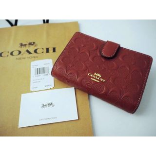 コーチ(COACH)の【新品未使用】COACH 二つ折り財布  ウォッシュドレッド(財布)