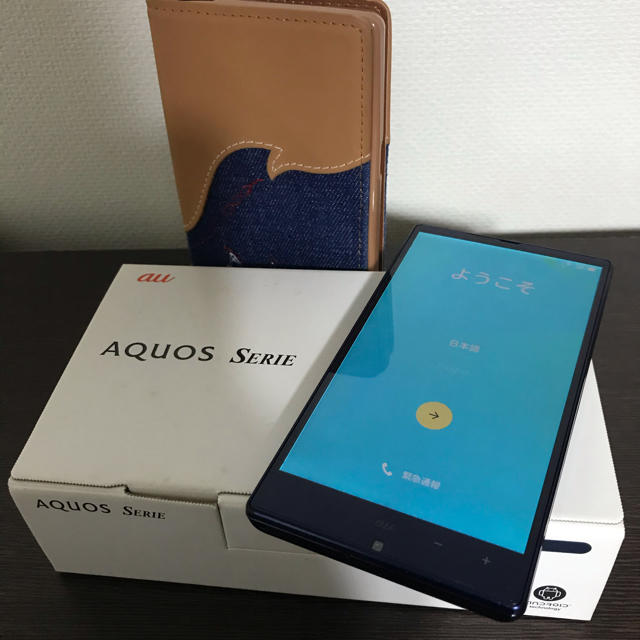 SHARP(シャープ)のau AQUOS SERIE SHL25 手帳型ケース付 スマホ/家電/カメラのスマートフォン/携帯電話(スマートフォン本体)の商品写真