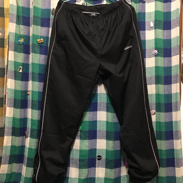 STUSSY(ステューシー)のstussy reflective side line track pant S メンズのパンツ(その他)の商品写真