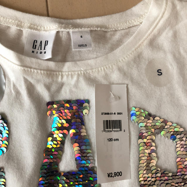 GAP Kids(ギャップキッズ)のgap  白ロンT  120センチ 未使用 ギャップ キラキラ  キッズ/ベビー/マタニティのキッズ服女の子用(90cm~)(Tシャツ/カットソー)の商品写真