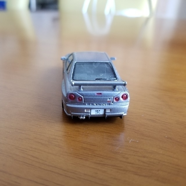 日産(ニッサン)の☆スカイラインR34 GT-R  シルバー 日産　NISSAN　ミニカー🎵 エンタメ/ホビーのおもちゃ/ぬいぐるみ(ミニカー)の商品写真