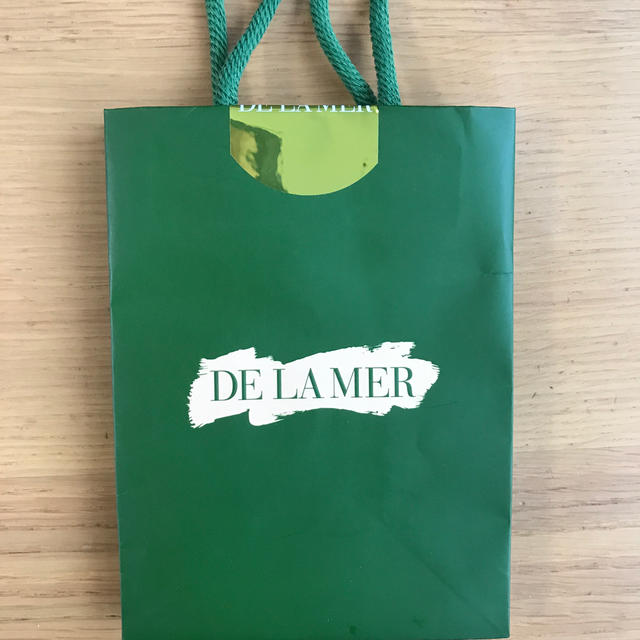 DE LA MER(ドゥラメール)のドゥ・ラ・メール と コスメデコルテ 紙袋 レディースのバッグ(ショップ袋)の商品写真