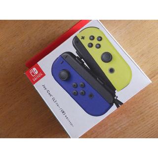 Nintendo Switch 未使用 Joy Con L ブルー R ネオンイエロー 各ストラップ黒の通販 ラクマ