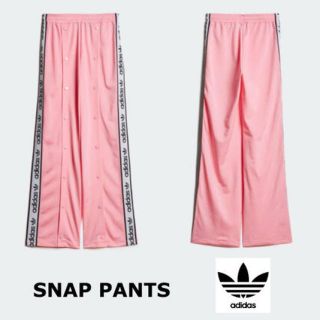 アディダス(adidas)のアディダス スナップパンツ ピンクS(カジュアルパンツ)