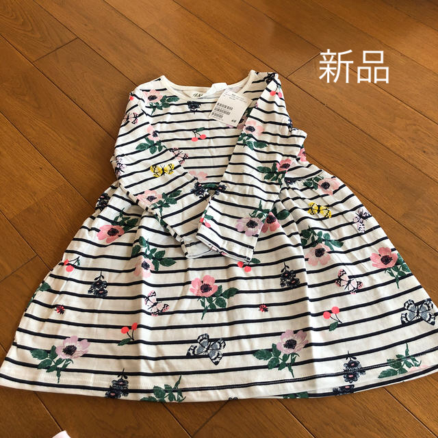 H&M(エイチアンドエム)の花柄ボーダーワンピース 90 キッズ/ベビー/マタニティのキッズ服女の子用(90cm~)(ワンピース)の商品写真