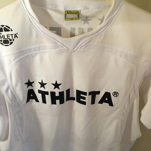 ATHLETA(アスレタ)のATHLETA. 半袖　白　サイズM スポーツ/アウトドアのサッカー/フットサル(ウェア)の商品写真