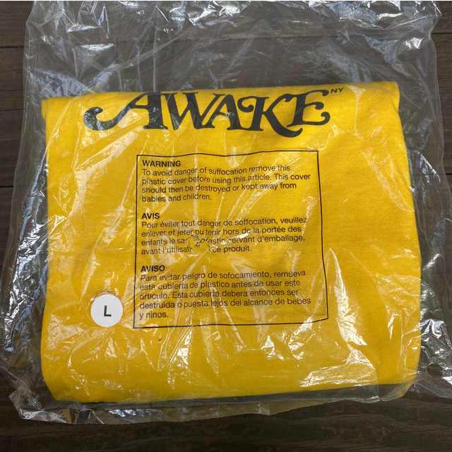 AWAKE(アウェイク)のawake gdc girls don't cry logo tee 黄色 メンズのトップス(Tシャツ/カットソー(半袖/袖なし))の商品写真