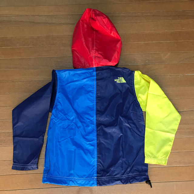 The North Face 120 ウィンドブレーカー 青地 黄色文字