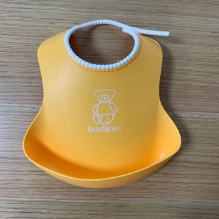 ベビービョルン(BABYBJORN)のBABY BJORN シリコンスタイ イエロー(お食事エプロン)