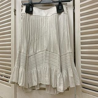インディヴィ(INDIVI)のINDIVI フレアアシメントリースカート  新品未使用(ひざ丈スカート)