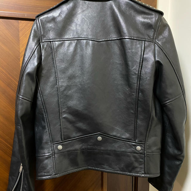 SAINT LAURENT - saint Laurent スタッズライダース 46 未使用の SAINT LAURENT - saint Laurent スタッズライダース 46 未使用の
