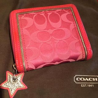 コーチ(COACH)のCOACH シグネチャー　ピンク　折り財布(財布)