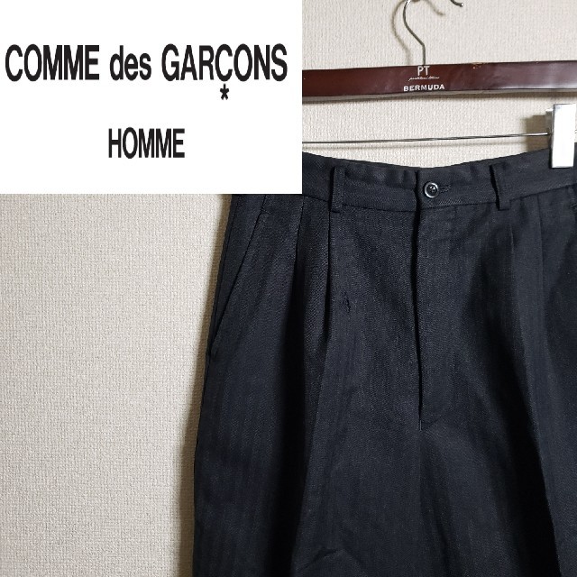 COMME des GARCONS(コムデギャルソン)のコムデギャルソン オム スラックス タック入り ワイド ヘリンボーン グレー メンズのパンツ(スラックス)の商品写真