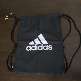 アディダス(adidas)の【新品】adidasビッグロゴバッグ ナップサック 黒(バッグパック/リュック)