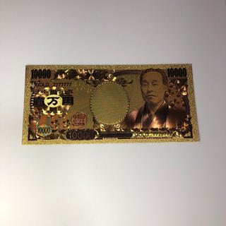 黄金に輝く 金色一万円札紙幣。 長財布へ。(その他)