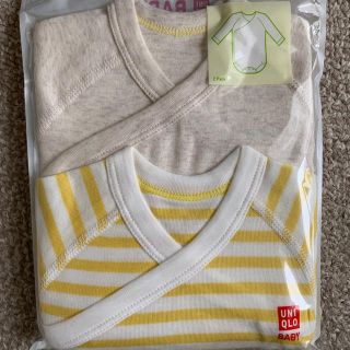 ユニクロ(UNIQLO)のKB様専用 60 ユニクロ ベビー ボディースーツ 肌着 黄 新品未開封 長袖 (肌着/下着)