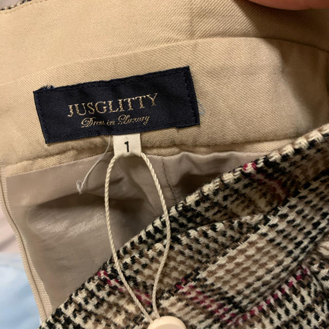 JUSGLITTY(ジャスグリッティー)のジャスグリッティー 変形グレンチェックフレアスカート レディースのスカート(ひざ丈スカート)の商品写真