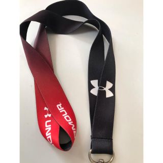 アンダーアーマー(UNDER ARMOUR)の【新品　非売品】アンダーアーマーネックストラップ(黒赤ロゴ入り)(ネックストラップ)