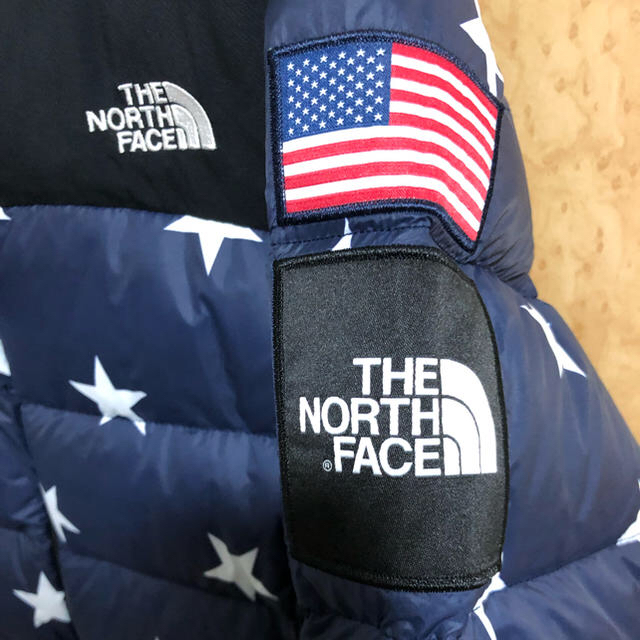 THE NORTH FACE(ザノースフェイス)のノースフェイス 星柄 星条旗 ヌプシ ダウンジャケット dark blue S レディースのジャケット/アウター(ダウンジャケット)の商品写真
