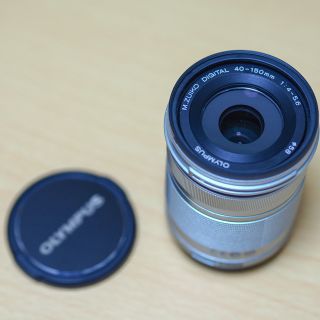 オリンパス(OLYMPUS)の【新品】OLYMPUS 望遠レンズ M.ZUIKO 40-150mm シルバー(レンズ(ズーム))