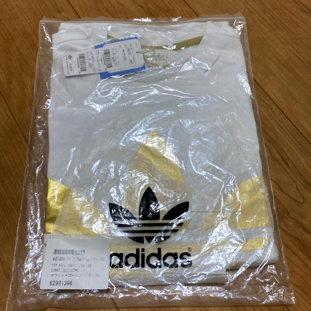 adidas(アディダス)の【値下げ】adidas originals Tシャツ　ホワイト×ゴールド メンズのトップス(Tシャツ/カットソー(半袖/袖なし))の商品写真